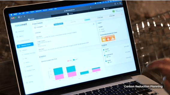 Laptop screen opened on Nocomed software showing a carbon analytics and SDG goals screen